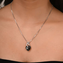 silver heart necklace for women black heart pendant sterling silver worn by a model