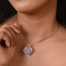silver jewelry sets worn by a model