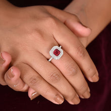 Double Halo Silver Ring with Red Cubic Zirconia-in hands
