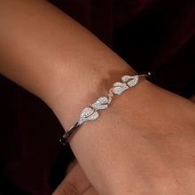 Graceful Leaf Design Silver Bracelet with Cubic Zirconia and Rose Gold Accents-in hands Model